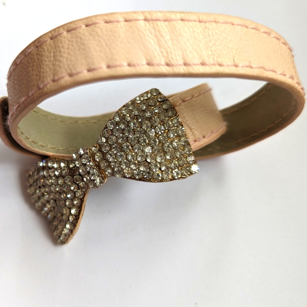 Wrap bracelet with clear stones bow.